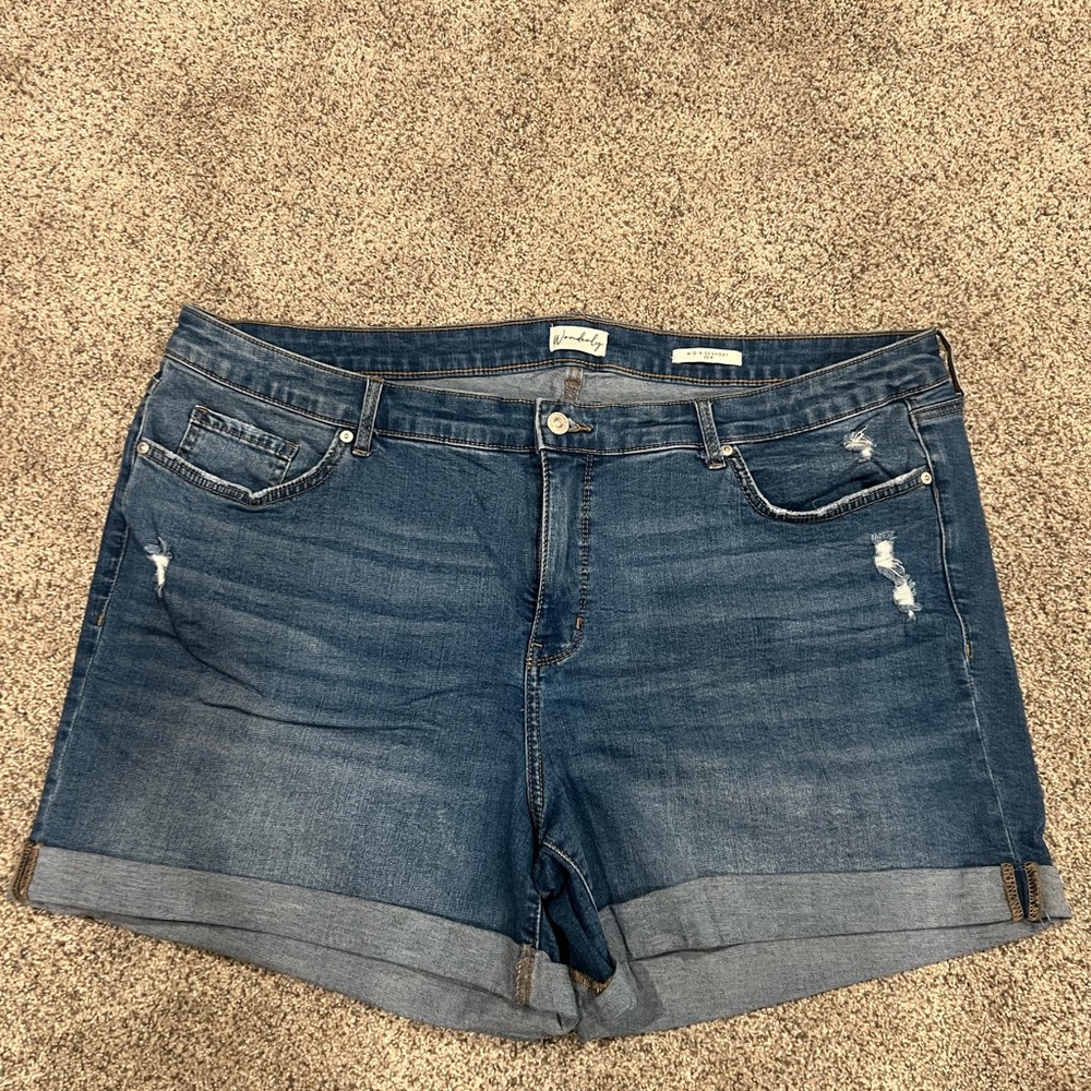 Wonderly Mid-Rise Distressed Rolled Hem Denim Shorts in Blue